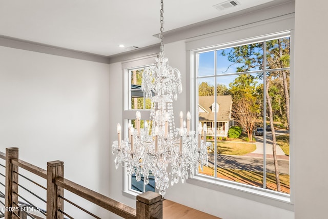 interior details with recessed lighting, a notable chandelier, and visible vents