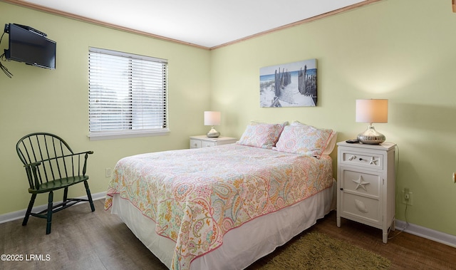 bedroom featuring dark hardwood / wood-style flooring and ornamental molding