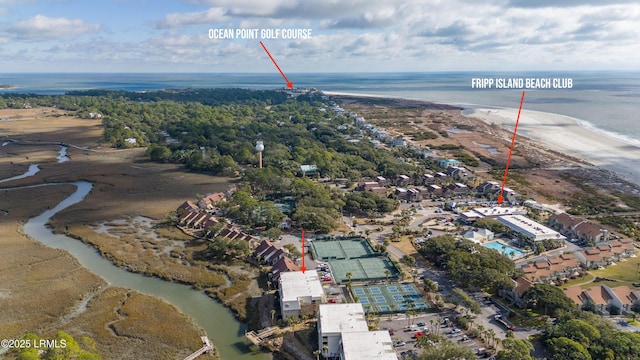 bird's eye view with a view of the beach and a water view