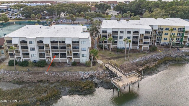 bird's eye view with a water view