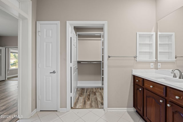 bathroom with vanity and tile patterned flooring