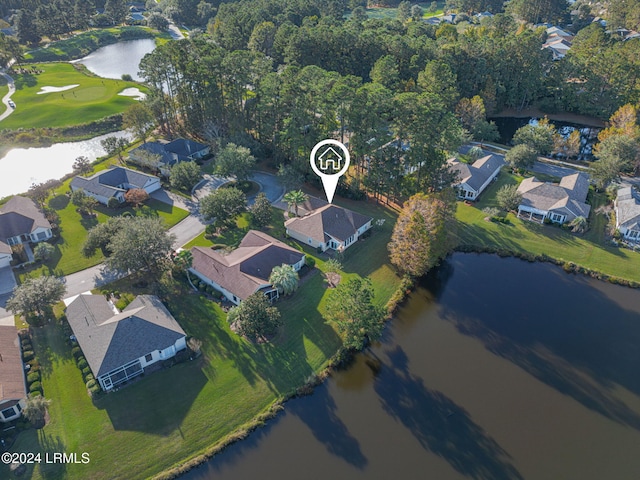 drone / aerial view with a water view