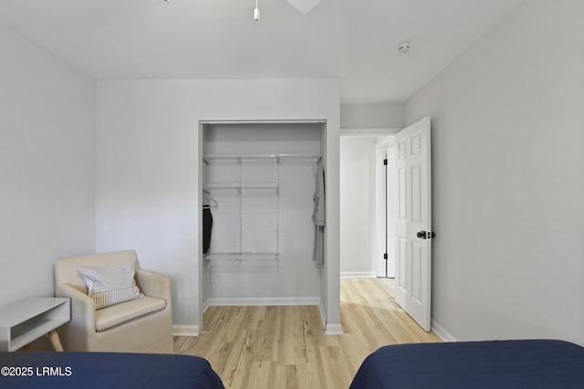 7 Three Mast Ln Unit 7, Hilton Head Island, SC 29928 - bedroom with wood finished floors, a closet, and baseboards