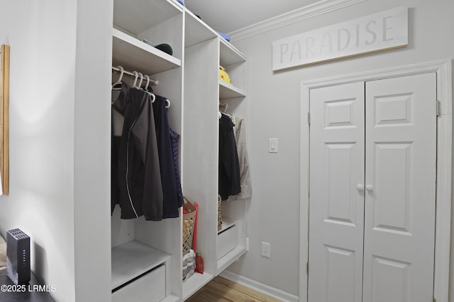 7 Three Mast Ln Unit 7, Hilton Head Island, SC 29928 - mudroom featuring ornamental molding, wood finished floors, and baseboards