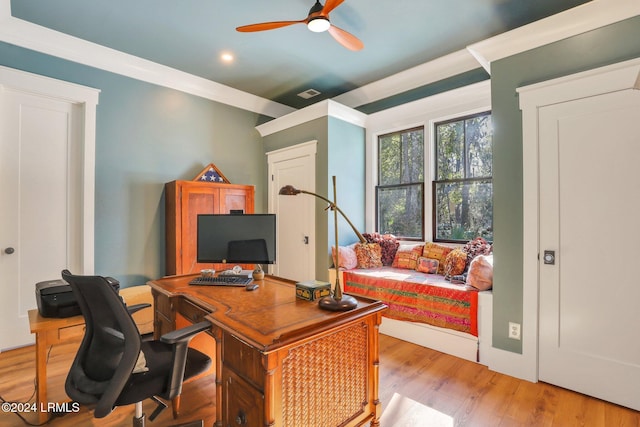 office area featuring crown molding, ceiling fan, and light hardwood / wood-style flooring