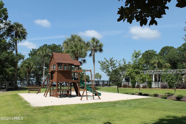 view of jungle gym with a lawn