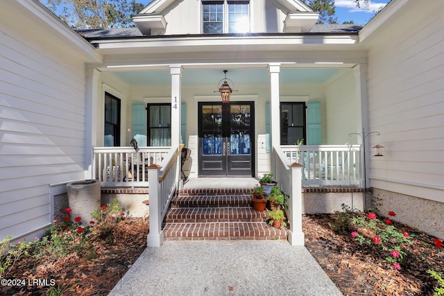 property entrance with french doors and covered porch