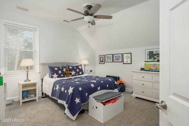 277 Pleasant Point Dr, Beaufort, SC 29907 - bedroom featuring carpet flooring, vaulted ceiling, a ceiling fan, and baseboards