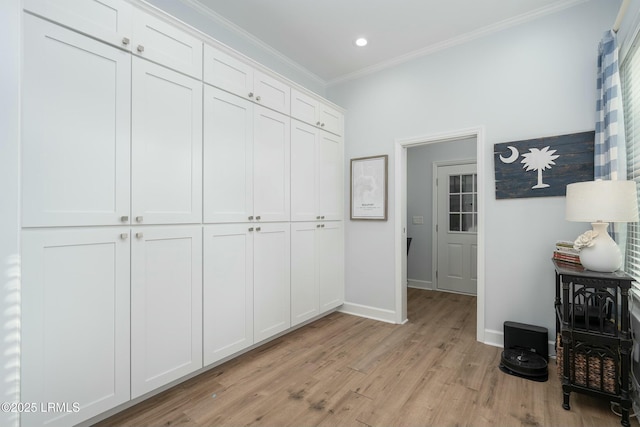 277 Pleasant Point Dr, Beaufort, SC 29907 - corridor featuring light wood-style flooring, crown molding, baseboards, and recessed lighting