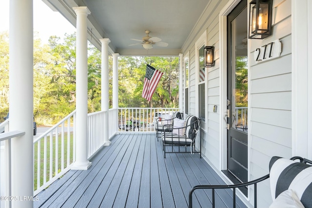 277 Pleasant Point Dr, Beaufort, SC 29907 - wooden porch featuring ceiling fan