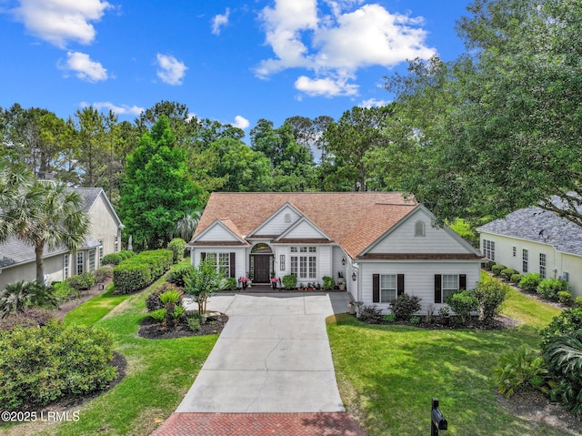 56 Waterford Dr, Bluffton, SC 29910 - view of front facade featuring concrete driveway and a front yard