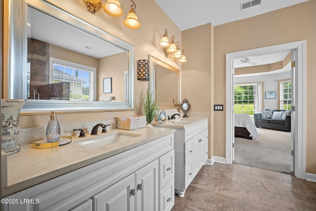 56 Waterford Dr, Bluffton, SC 29910 - bathroom featuring double vanity, a ceiling fan, and connected bathroom