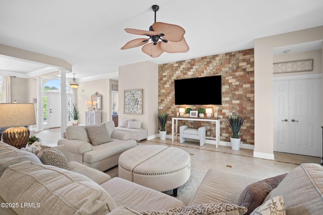 56 Waterford Dr, Bluffton, SC 29910 - living area featuring ceiling fan, decorative columns, light tile patterned flooring, and ornamental molding