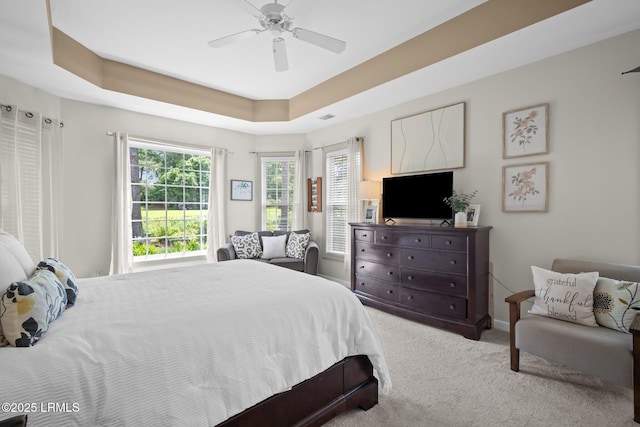 56 Waterford Dr, Bluffton, SC 29910 - bedroom featuring carpet, a ceiling fan, and a tray ceiling