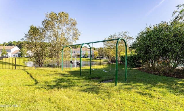 view of jungle gym featuring a yard