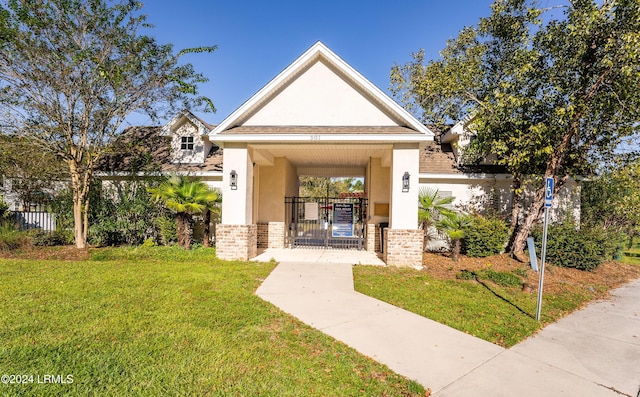 view of home's community featuring a lawn