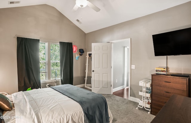 bedroom featuring ceiling fan, lofted ceiling, and carpet