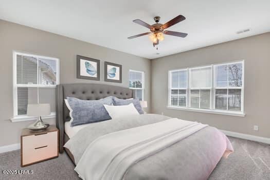 bedroom with baseboards, ceiling fan, and carpet