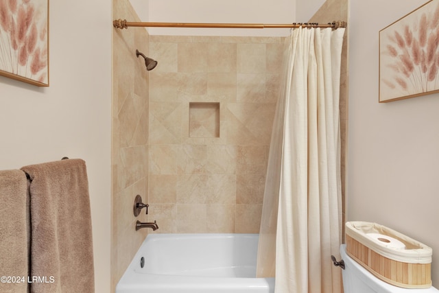 bathroom with shower / bathtub combination with curtain