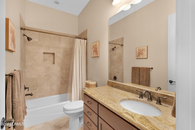 full bathroom with tile patterned floors, vanity, toilet, and shower / bath combo