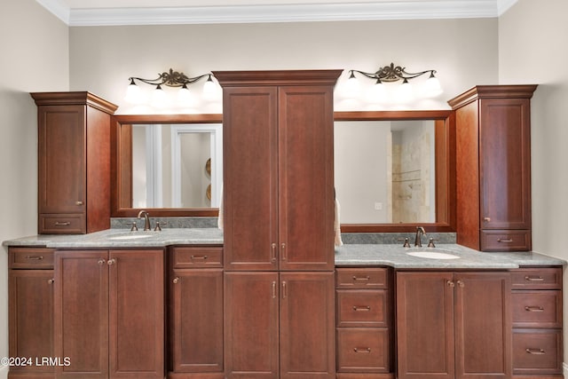 bathroom with vanity and ornamental molding