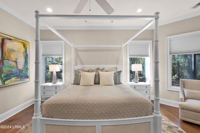 bedroom featuring crown molding, ceiling fan, dark hardwood / wood-style floors, and multiple windows