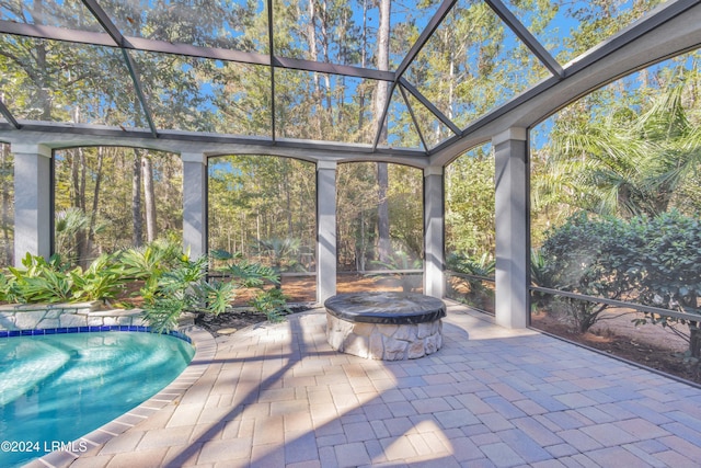 exterior space with a patio area and a fire pit