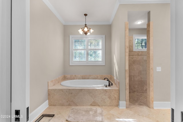 bathroom featuring ornamental molding, plenty of natural light, and separate shower and tub