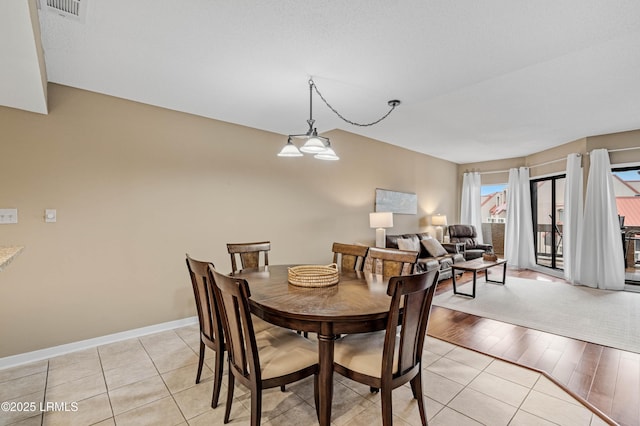 13 Harbourside Ln Unit 7170, Hilton Head Island, SC 29928 - dining area featuring light tile patterned floors and baseboards