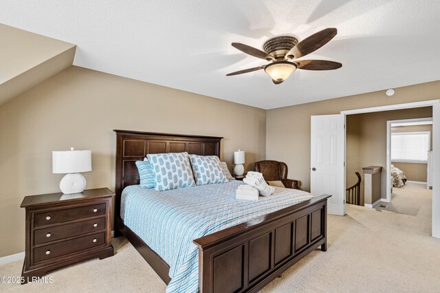 13 Harbourside Ln Unit 7170, Hilton Head Island, SC 29928 - bedroom featuring light colored carpet, a ceiling fan, and baseboards