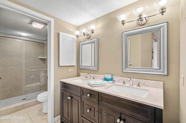 13 Harbourside Ln Unit 7170, Hilton Head Island, SC 29928 - bathroom featuring a textured ceiling, toilet, double vanity, a stall shower, and tile patterned flooring