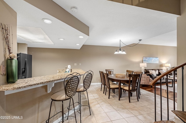 13 Harbourside Ln Unit 7170, Hilton Head Island, SC 29928 - dining area featuring recessed lighting, light tile patterned flooring, baseboards, and stairs
