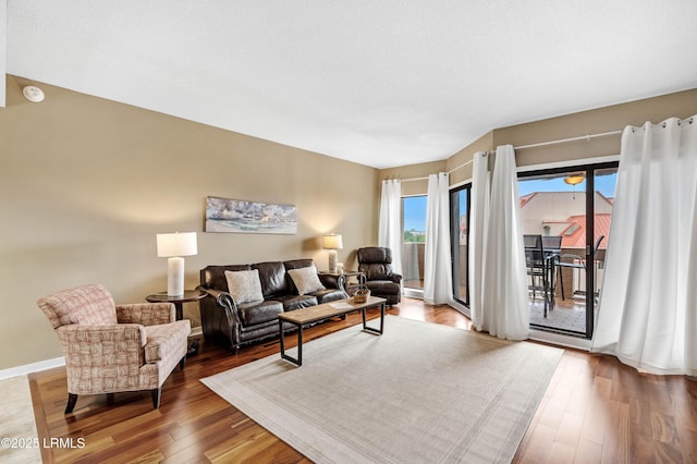 13 Harbourside Ln Unit 7170, Hilton Head Island, SC 29928 - living area with wood finished floors and baseboards