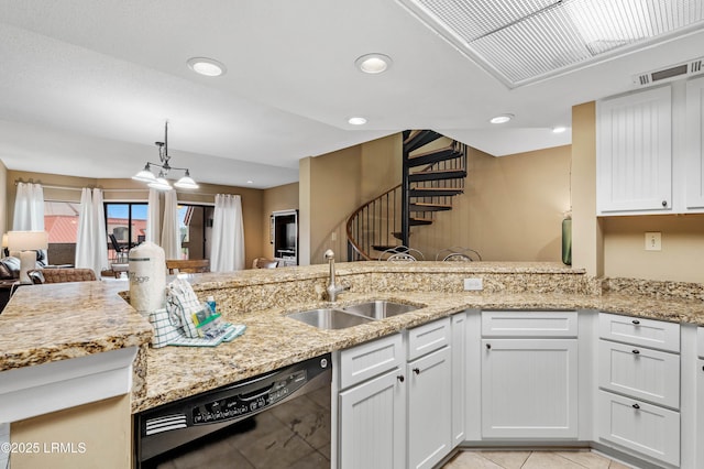 13 Harbourside Ln Unit 7170, Hilton Head Island, SC 29928 - kitchen with black dishwasher, a sink, white cabinets, light stone countertops, and open floor plan