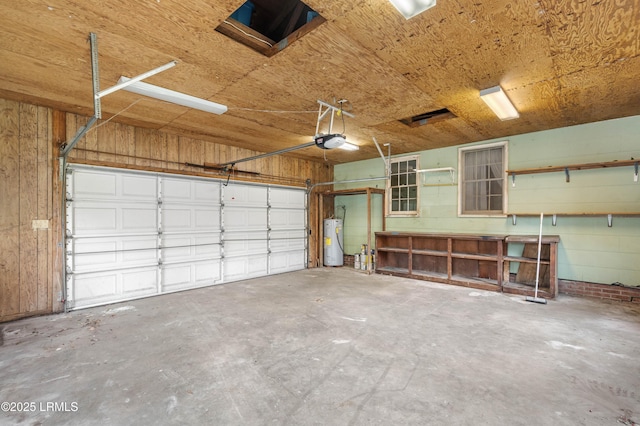 156 James St, Beaufort, SC 29902 - garage featuring water heater and a garage door opener
