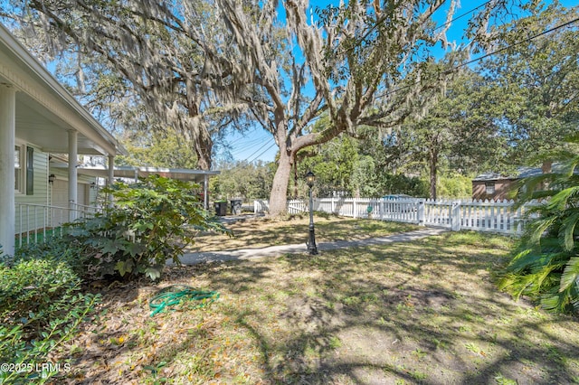 view of yard with fence