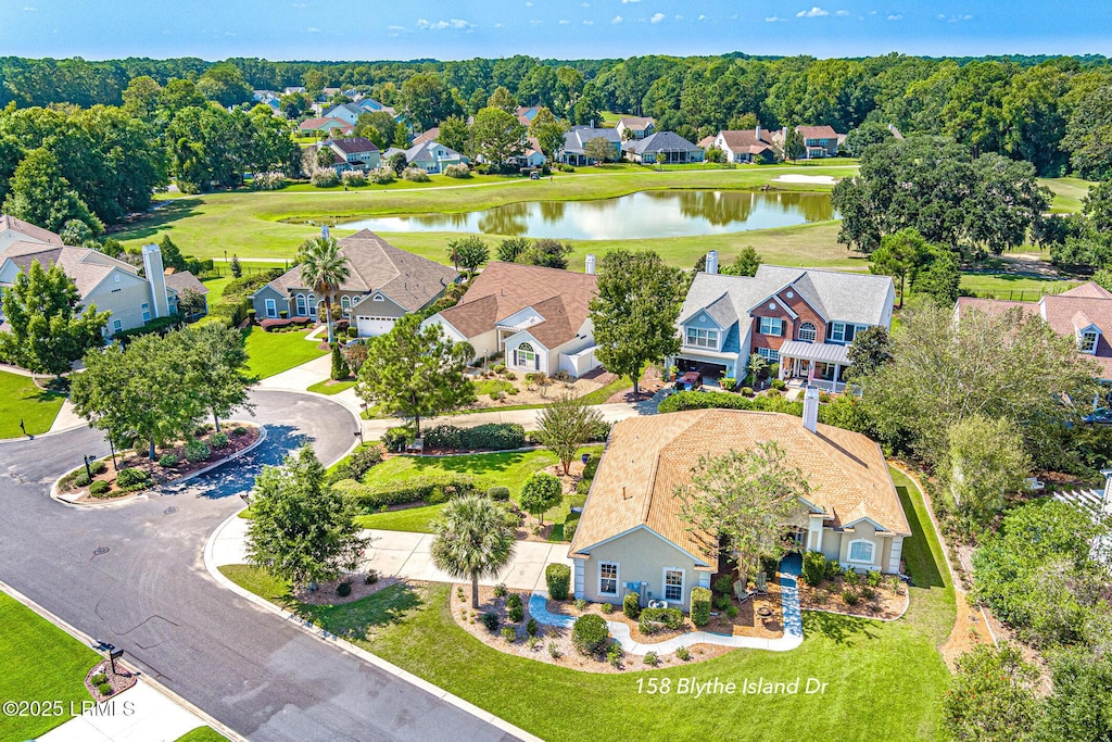 bird's eye view with a water view