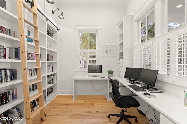 office space featuring light hardwood / wood-style floors