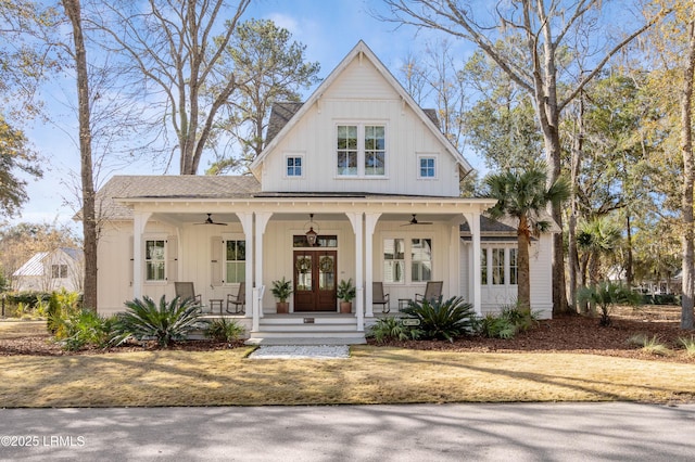 modern inspired farmhouse featuring french doors and covered porch