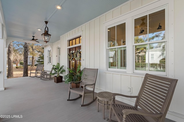 view of patio featuring ceiling fan and a porch