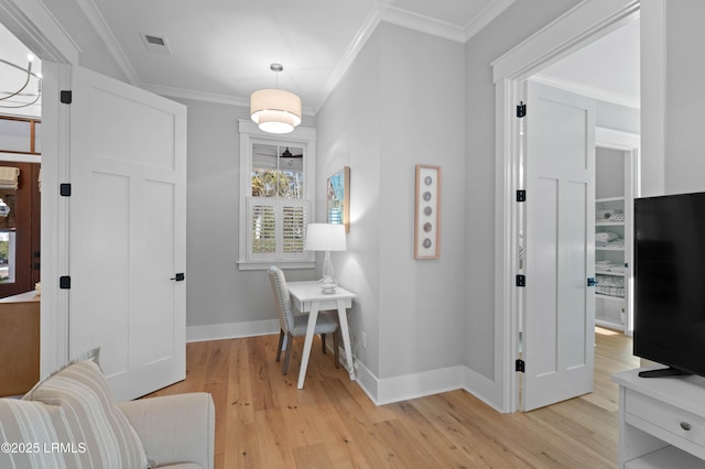 office featuring crown molding and light wood-type flooring