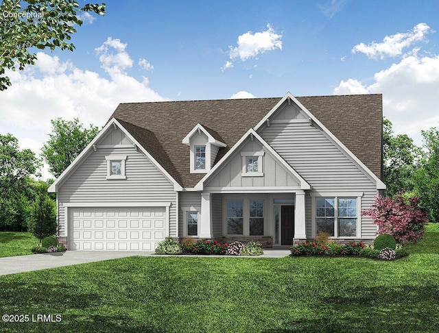 view of front of house with a front yard and a garage