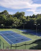 40 Folly Field Rd Unit A130, Hilton Head Island, SC 29928 - view of tennis court featuring community basketball court
