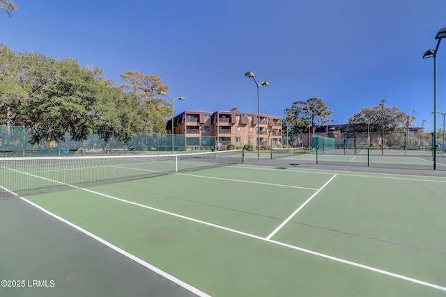 40 Folly Field Rd Unit A130, Hilton Head Island, SC 29928 - view of tennis court featuring community basketball court
