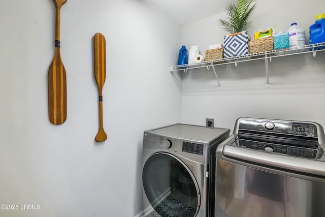 laundry room featuring separate washer and dryer