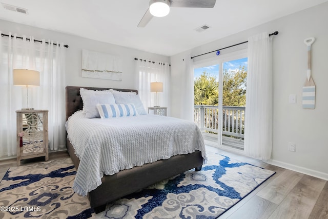 bedroom with ceiling fan, access to outside, and light hardwood / wood-style floors