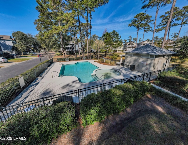 view of swimming pool with a patio