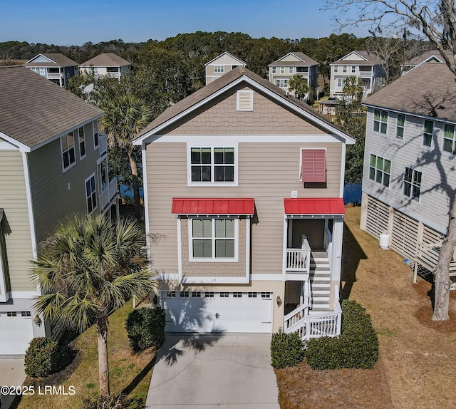 view of front of property with a garage