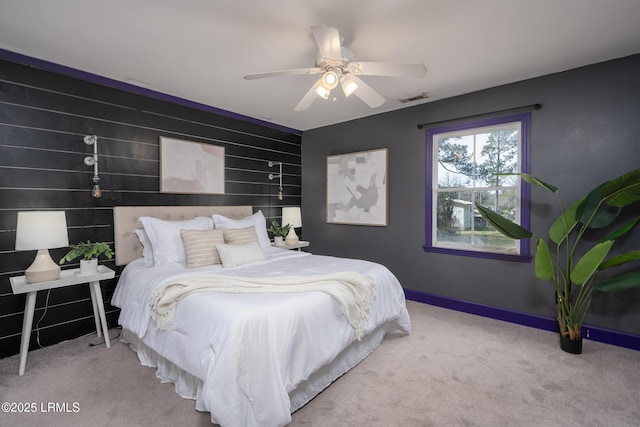 bedroom with carpet, visible vents, ceiling fan, and baseboards