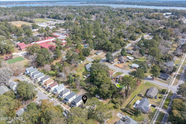 birds eye view of property with a residential view